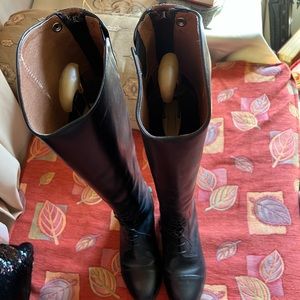 Ariat black horse riding shoes.